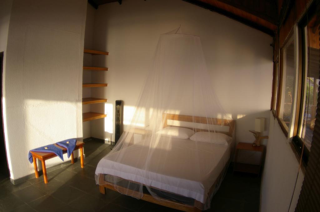 Casa Agua Vela Hostal Хуан-де-Акоста Номер фото